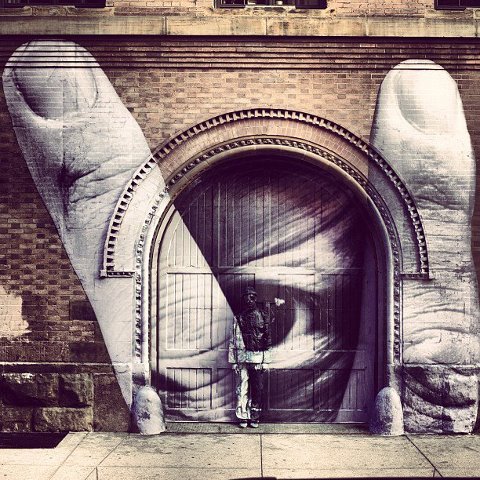 eye and fingers street art